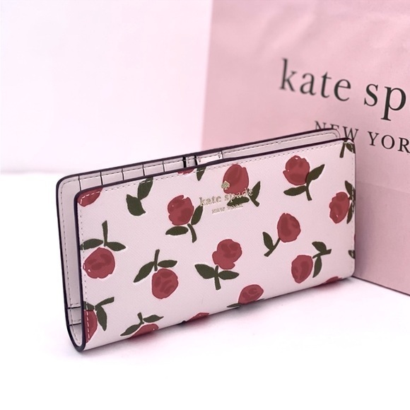kate spade Handbags - Kate Spade Rose Dana Large Slim Bifold Wallet
